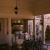 Interior of screened porch, looking toward grilling area